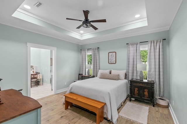 3155 Eddins Rd, Dothan, AL 36301 - bedroom with a raised ceiling, light wood-style floors, recessed lighting, ceiling fan, and crown molding