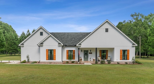 3155 Eddins Rd, Dothan, AL 36301 - modern farmhouse style home with covered porch, roof with shingles, and a front yard