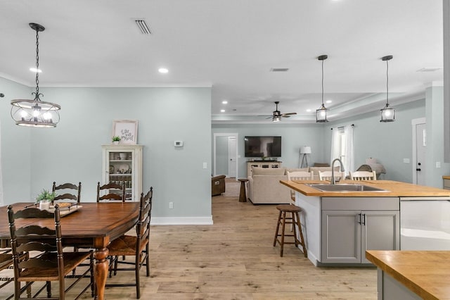 3155 Eddins Rd, Dothan, AL 36301 - dining room with light wood-type flooring, recessed lighting, a ceiling fan, and crown molding