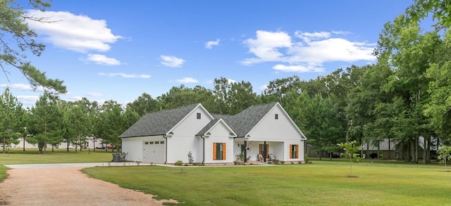 3155 Eddins Rd, Dothan, AL 36301 - modern inspired farmhouse featuring a garage, covered porch, driveway, and a front lawn