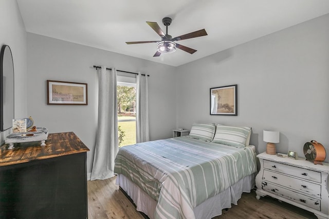 3155 Eddins Rd, Dothan, AL 36301 - bedroom with light wood finished floors and a ceiling fan