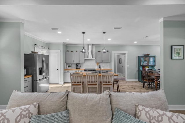 3155 Eddins Rd, Dothan, AL 36301 - living area featuring light wood finished floors, recessed lighting, and crown molding