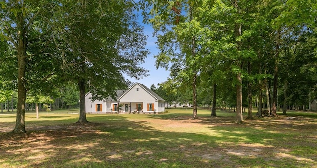 3155 Eddins Rd, Dothan, AL 36301 - view of grassy yard with covered porch