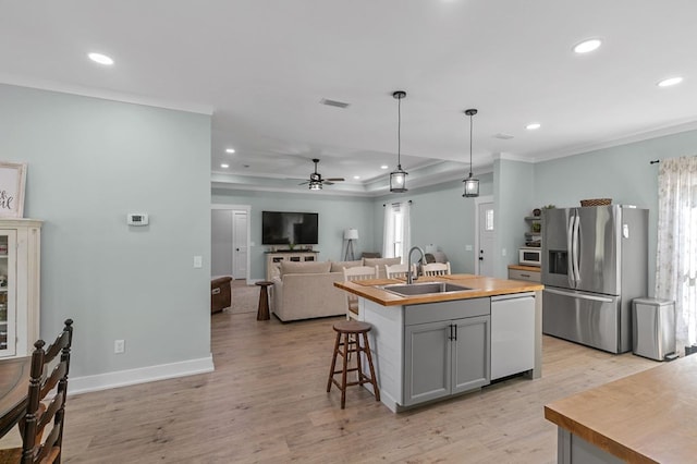 3155 Eddins Rd, Dothan, AL 36301 - kitchen featuring stainless steel refrigerator with ice dispenser, dishwasher, ceiling fan, recessed lighting, and light wood-type flooring