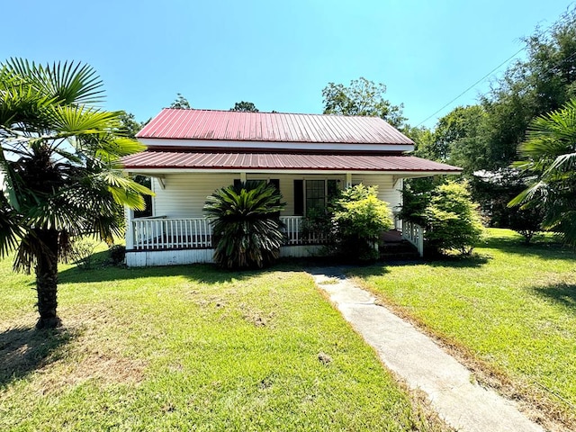 bungalow-style house with a front lawn