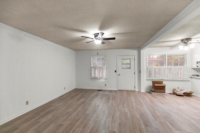 1700 Randall Rd, Dothan, AL 36303 - entryway with ceiling fan, a textured ceiling, wood finished floors, and plenty of natural light