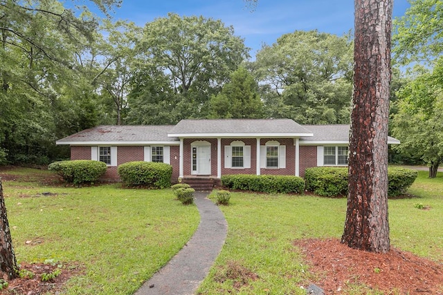1700 Randall Rd, Dothan, AL 36303 - single story home with a front lawn and brick siding