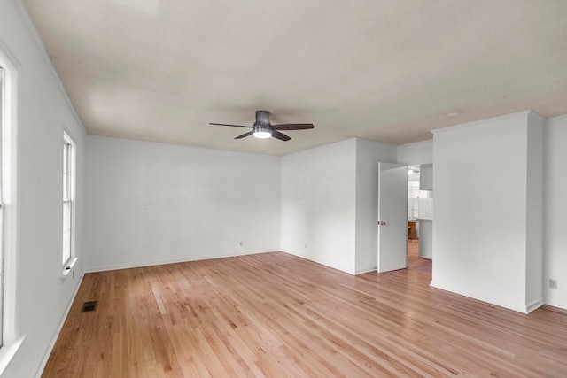 1700 Randall Rd, Dothan, AL 36303 - empty room featuring ceiling fan, light wood finished floors, crown molding, and baseboards