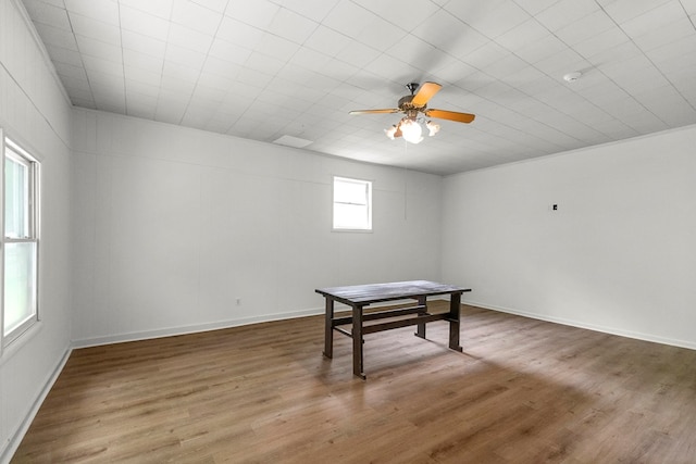 1700 Randall Rd, Dothan, AL 36303 - game room featuring ceiling fan, wood finished floors, and baseboards