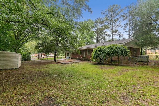 1700 Randall Rd, Dothan, AL 36303 - view of grassy yard with a patio