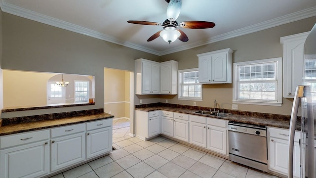 kitchen featuring ceiling fan with notable chandelier, dishwasher, white cabinetry, sink, and light tile patterned flooring