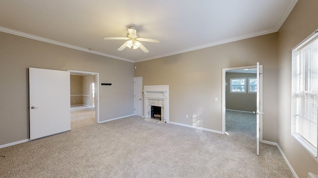 unfurnished living room with ceiling fan, light colored carpet, and ornamental molding