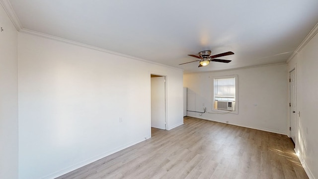 empty room with light wood-type flooring, ceiling fan, ornamental molding, and cooling unit