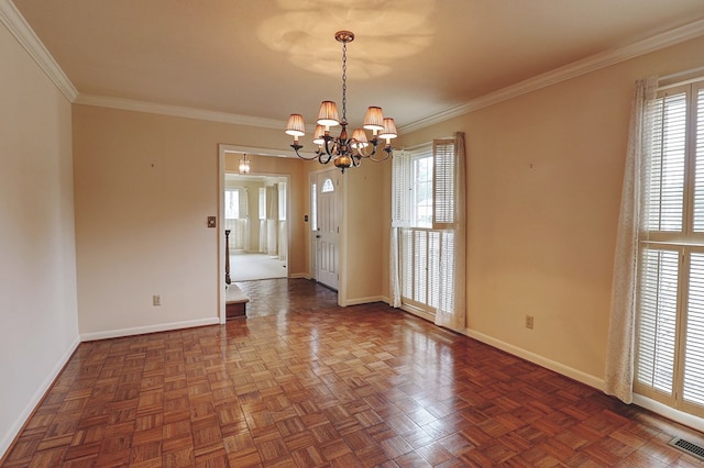 empty room featuring crown molding, a chandelier, and dark parquet floors