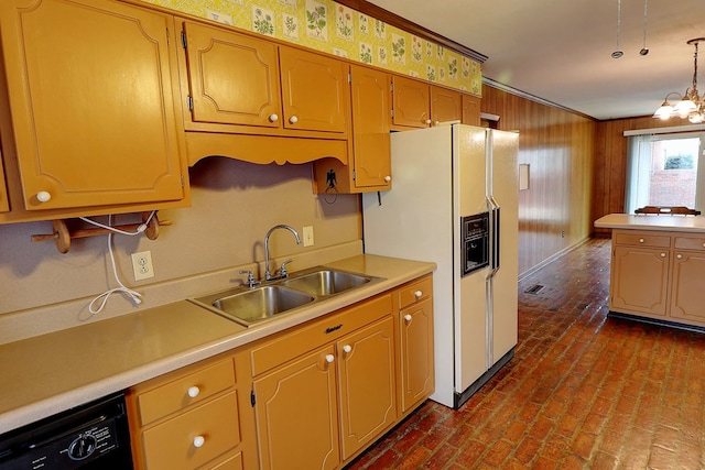 kitchen with pendant lighting, black dishwasher, sink, ornamental molding, and white fridge with ice dispenser