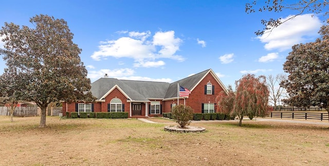 front facade featuring a front yard