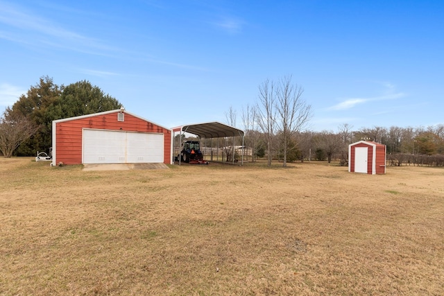 view of yard featuring a carport and a storage shed