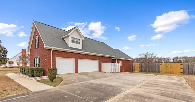 view of home's exterior with a garage