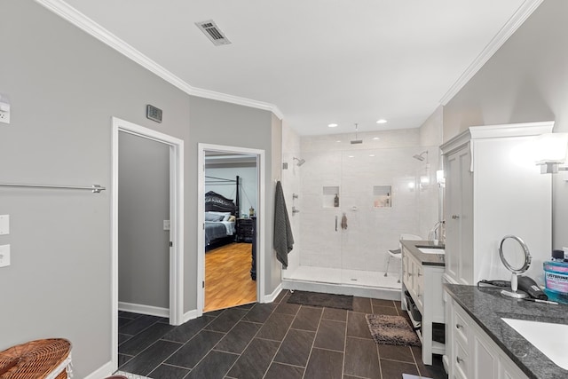 bathroom featuring vanity, an enclosed shower, and crown molding