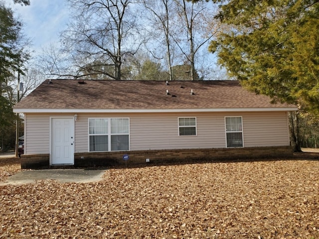 back of property with a patio area