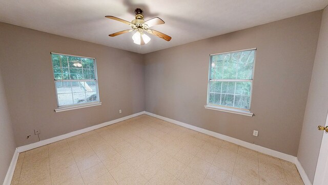 806 County Road 23, Skipperville, AL 36374 - spare room featuring ceiling fan and baseboards