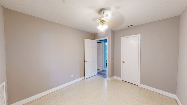 806 County Road 23, Skipperville, AL 36374 - unfurnished bedroom featuring a ceiling fan and light floors