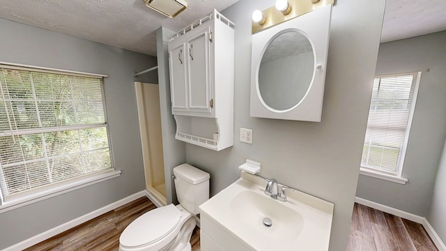 806 County Road 23, Skipperville, AL 36374 - full bath with wood finished floors, a shower, and vanity