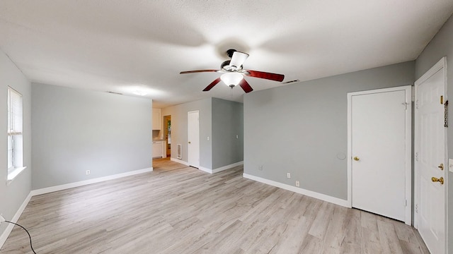806 County Road 23, Skipperville, AL 36374 - unfurnished room featuring a ceiling fan and light wood finished floors