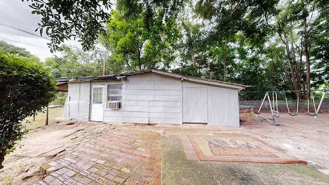 806 County Road 23, Skipperville, AL 36374 - view of outdoor structure with a playground and cooling unit