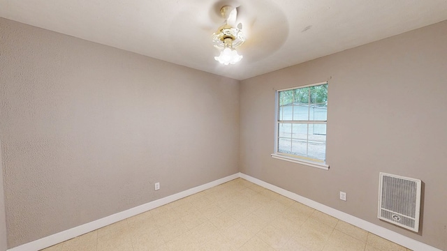 806 County Road 23, Skipperville, AL 36374 - spare room with heating unit and light flooring