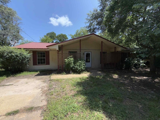 230 Sharon Ct, Ozark, AL 36360 - single story home with a metal roof