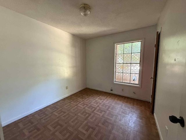230 Sharon Ct, Ozark, AL 36360 - unfurnished room with a textured ceiling and baseboards