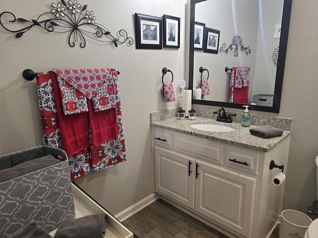 526 Ridgeland Rd, Dothan, AL 36301 - bathroom featuring wood finished floors and vanity