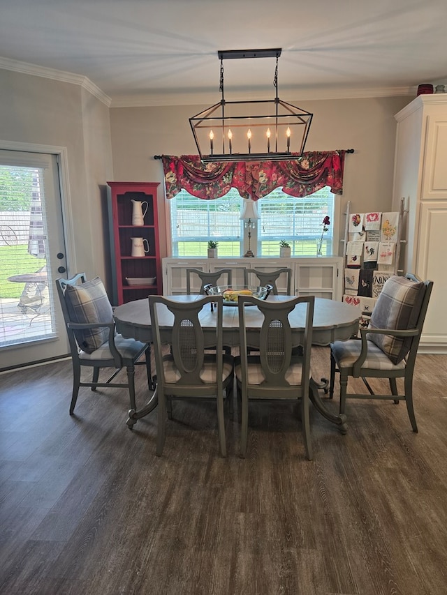 526 Ridgeland Rd, Dothan, AL 36301 - dining space with dark wood-style flooring, ornamental molding, and a chandelier