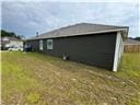 205 Mairead Dr, Dothan, AL 36301 - view of side of home with a yard