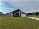 205 Mairead Dr, Dothan, AL 36301 - view of property exterior featuring a garage, concrete driveway, and a yard