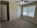 205 Mairead Dr, Dothan, AL 36301 - unfurnished bedroom with carpet floors and ceiling fan
