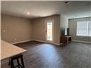 205 Mairead Dr, Dothan, AL 36301 - unfurnished living room with baseboards