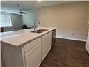 205 Mairead Dr, Dothan, AL 36301 - kitchen with light countertops and white cabinetry