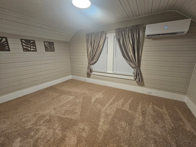 carpeted spare room with a wall unit AC, wood ceiling, and lofted ceiling