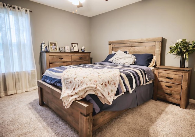 370 Airport Rd, Slocomb, AL 36375 - bedroom featuring light carpet and a ceiling fan
