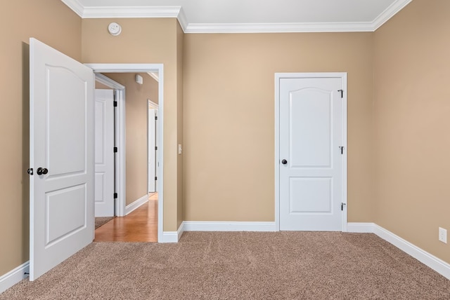 2045 Holland Rd, Newton, AL 36352 - unfurnished bedroom featuring carpet, ornamental molding, and baseboards