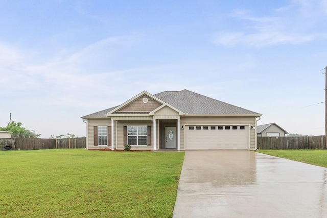 2045 Holland Rd, Newton, AL 36352 - view of front of property featuring concrete driveway and an attached garage