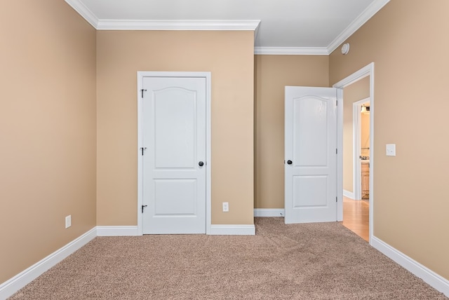 2045 Holland Rd, Newton, AL 36352 - unfurnished bedroom with crown molding, carpet flooring, and baseboards