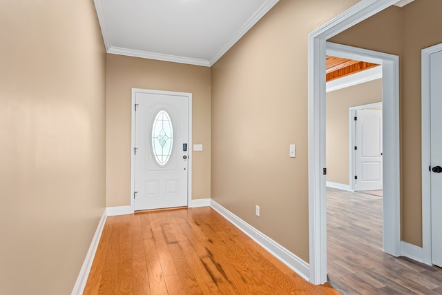 2045 Holland Rd, Newton, AL 36352 - entryway with light wood finished floors, crown molding, and baseboards
