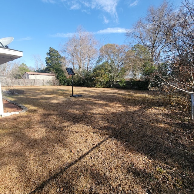 view of yard with fence