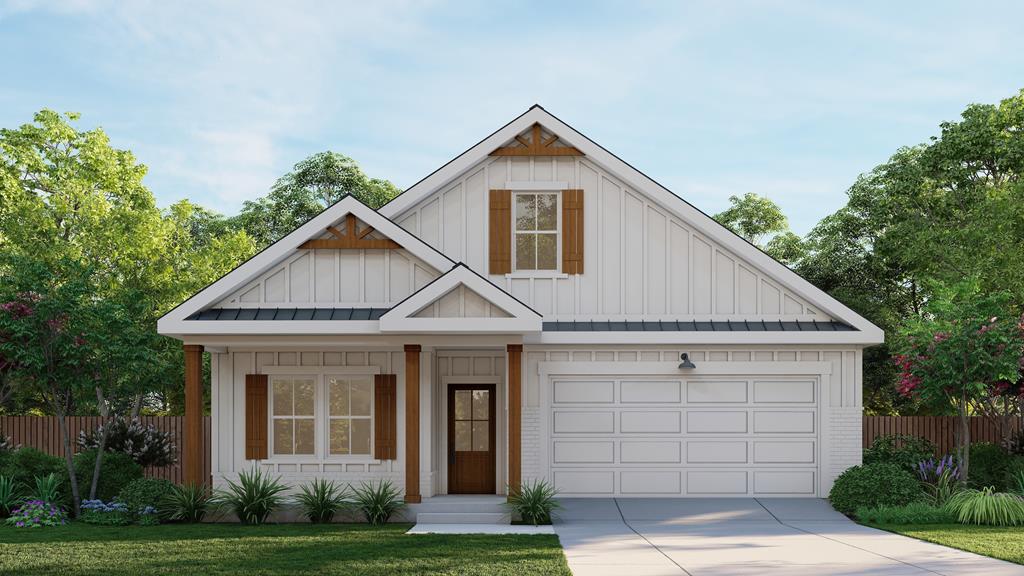 95 Jeter Dr, Midland City, AL 36350 - modern farmhouse style home with board and batten siding, driveway, a garage, and brick siding