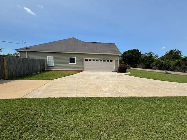 2103 Holland Rd, Newton, AL 36352 - view of home's exterior with an attached garage, driveway, and roof with shingles