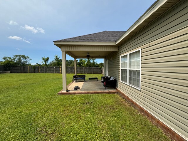 2103 Holland Rd, Newton, AL 36352 - view of yard featuring a ceiling fan and a patio
