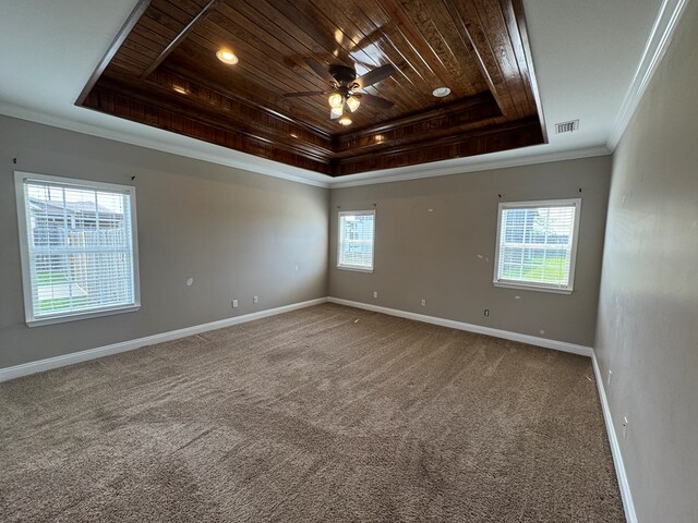 2103 Holland Rd, Newton, AL 36352 - unfurnished room with a raised ceiling, wood ceiling, crown molding, baseboards, and a ceiling fan
